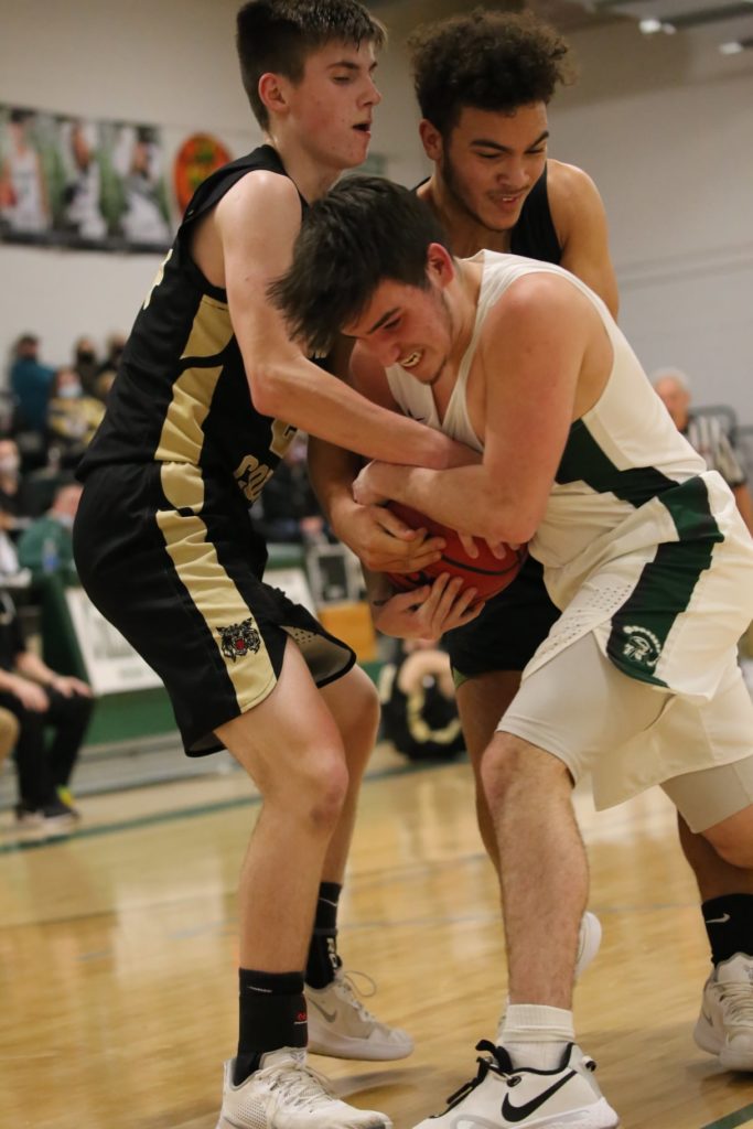 #2 Cort Robertson fighting hard for the jump ball.