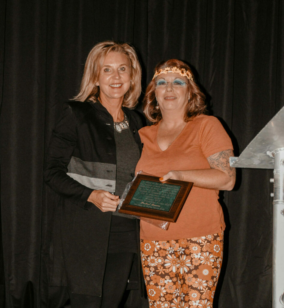 Darlene Brewer accepted the Memorial Recognition Award on behalf of her late father, Herbert Brewer.