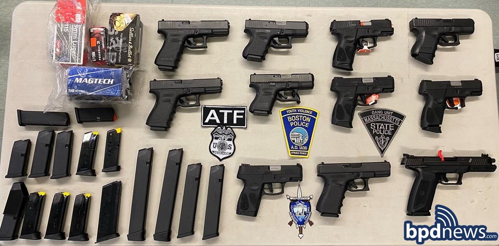 The Boston Police Department released the photo above of the guns and ammunition recovered from Lutts man John Pierre
