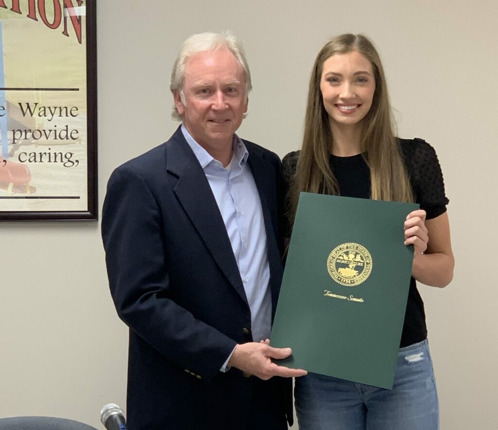   Outstanding WCHS basketball player Blair Baugus, who has received many awards and accolades, was presented with a proclamation at the recent meeting of the Wayne County School Board. State Senator Page Walley sponsored the proclamation in the Tennessee State Legislature, honoring Miss Baugus for her many accomplishments.