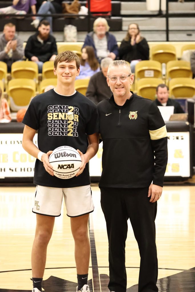 Senior Wildcat Tyler Moser from Wayne County High School scored his 1,000 career point in the game against county rivals, the Collinwood Trojans on February 1st. Tyler has only dressed out for basketball the past three years of his high school career, making this an even more special achievement.